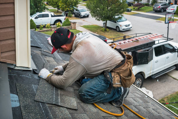 Professional Emergency Roof Repair technician working in Lakewood, NY